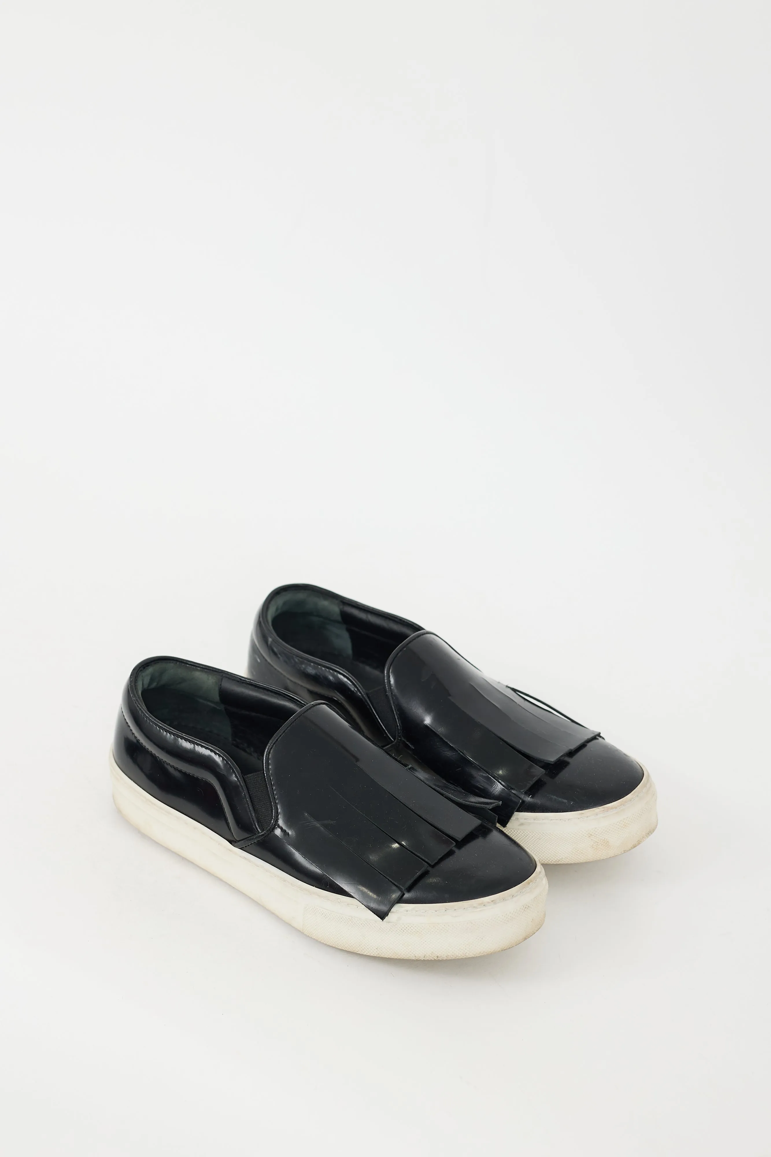 Black Leather Fringe Slip On Sneaker