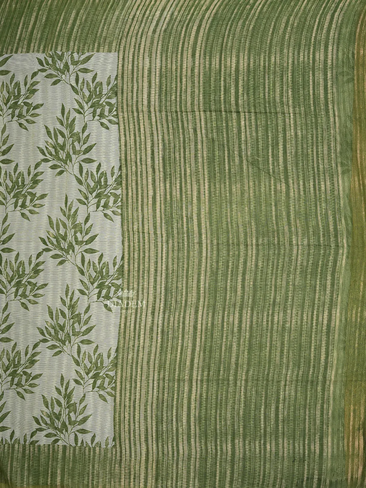 Cream Cotton Saree with Leaf Designs on the Body with Contrast Green Border