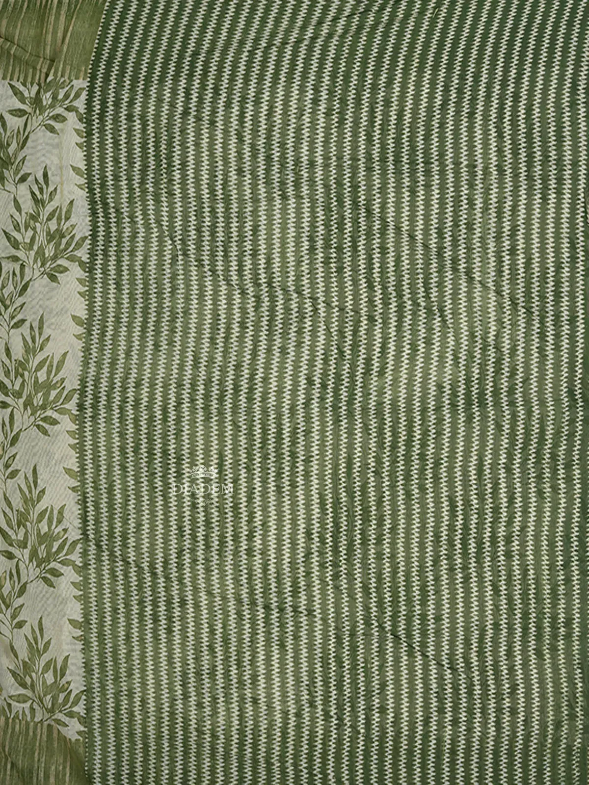 Cream Cotton Saree with Leaf Designs on the Body with Contrast Green Border